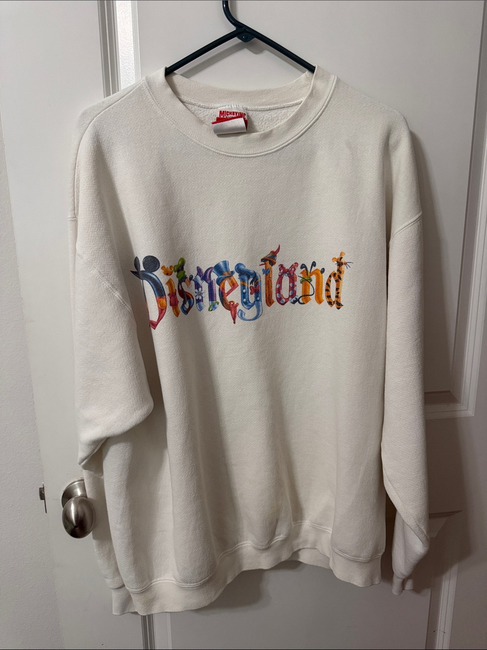 Disney Cream Crewneck Sweatshirt with Multicolor Disneyland Logo